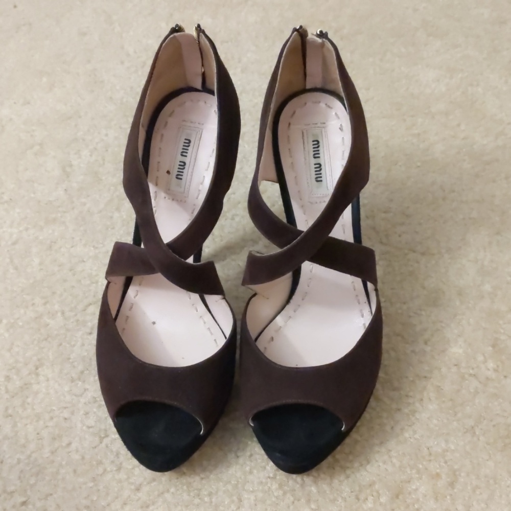 Miu Miu open toe heels.